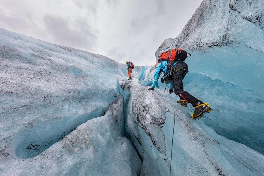 Ice climbing in Iceland is a thrilling ascent up frozen waterfalls and icy glaciers, set against the backdrop of the country’s dramatic arctic scenery (Source: Freepik)