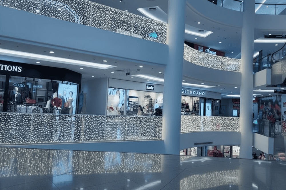 Visitors can explore a shopping mall filled with diverse fashion brands, restaurants, and entertainment services