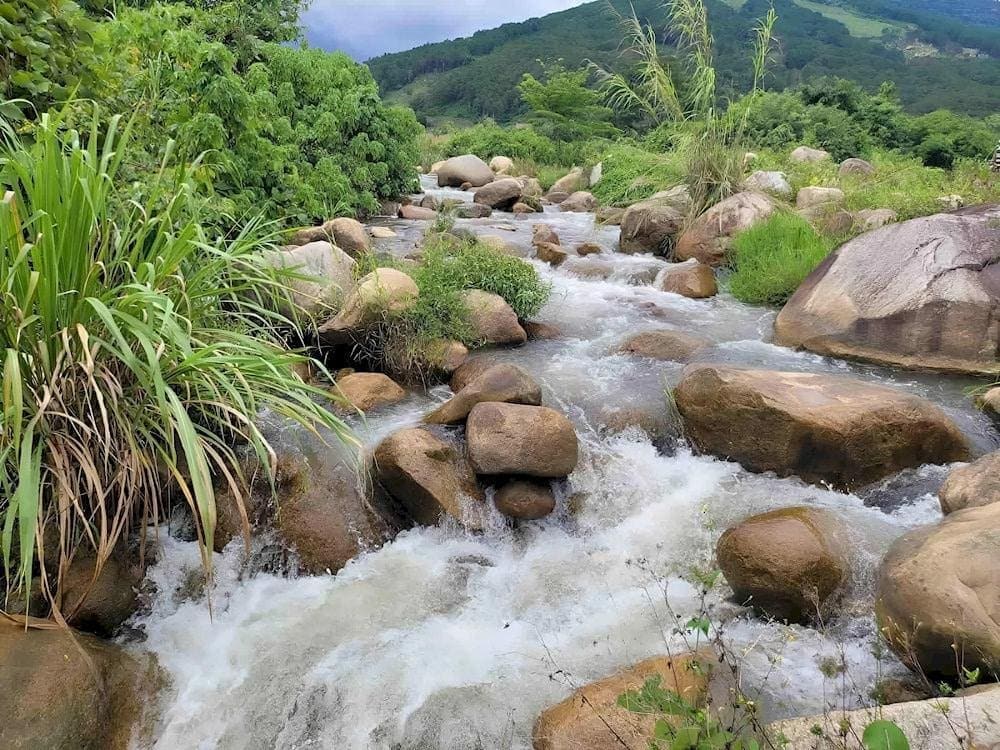 Suoi Rong’s cool streams and waterfalls offer fresh mountain air