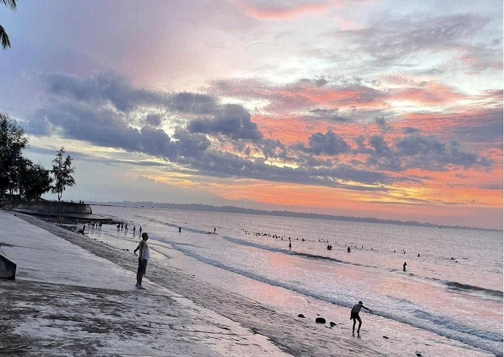 Watching the sunset while strolling along the beach creates a peaceful atmosphere