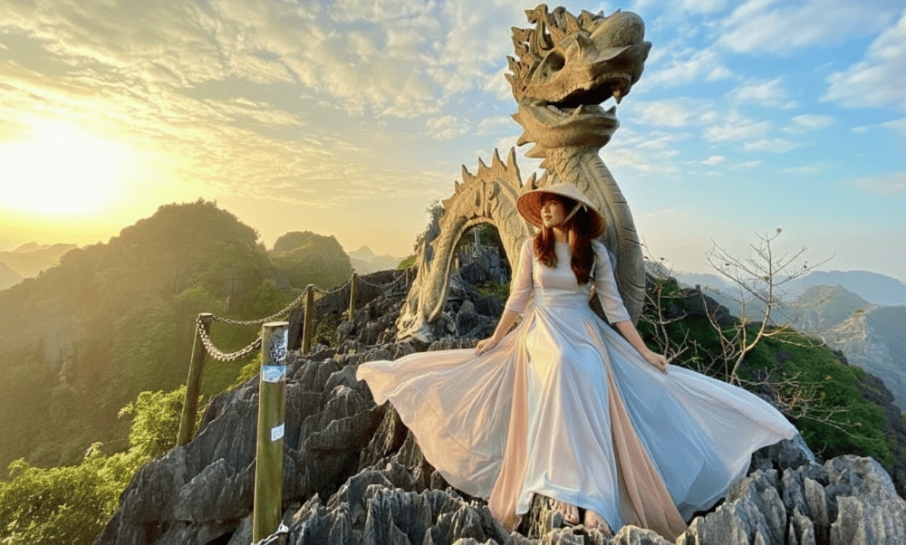 Visitors are greeted by the striking sight of a winding stone dragon sculpture that gracefully stretches along the mountain ridge