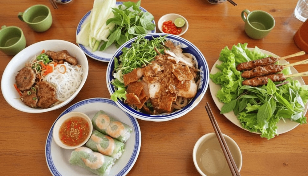 Sample must-try dishes like cao lau, banh xeo, or grilled skewers right from the street