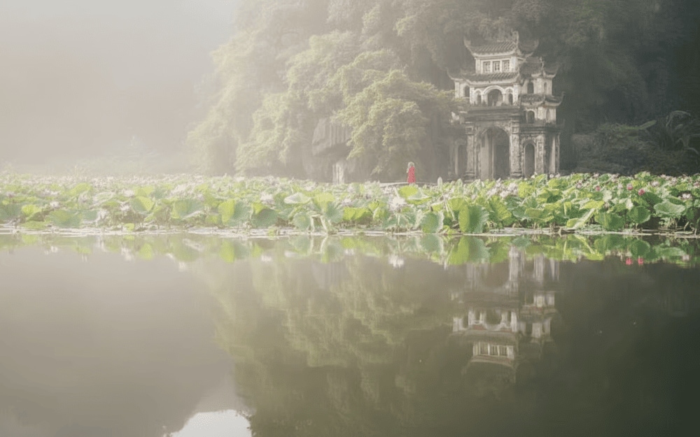 Bich Dong Pagoda nestles within the mountains, exuding an ancient and sacred charm