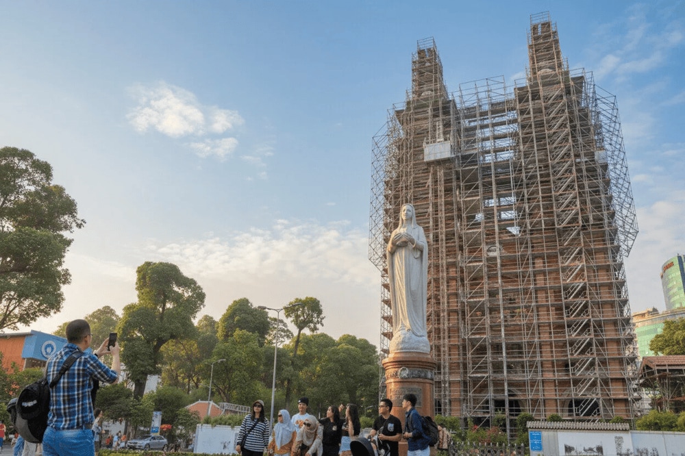 You can take photos in front of the church, where the iconic statue of Our Lady of Peace stands
