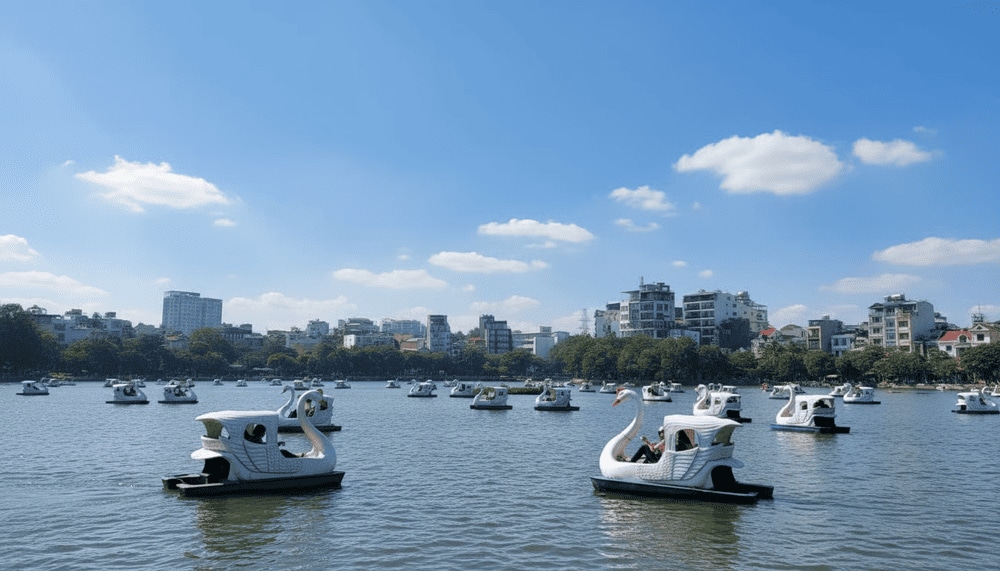 Pedaling on Truc Bach Lake is a pleasure for visitors of all ages
