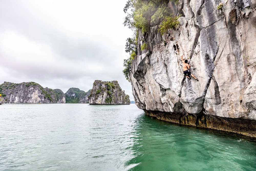 Rock climbing at Tiger Beach Lan Ha Bay is a famous activity