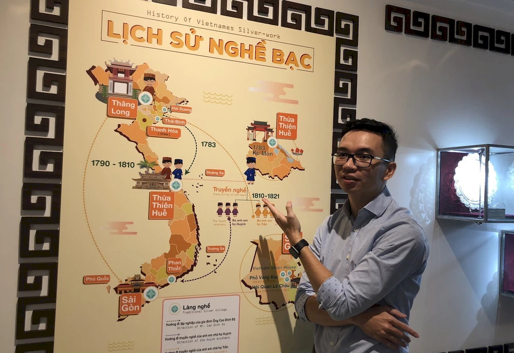 A map of the history of silver making in Vietnam is displayed inside the House